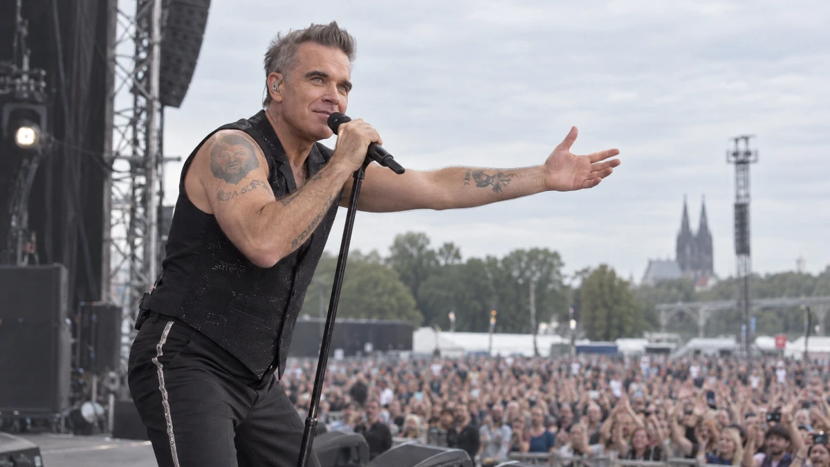 Robbie Williams kann nach Steuerprüfung auf einen OBE hoffen